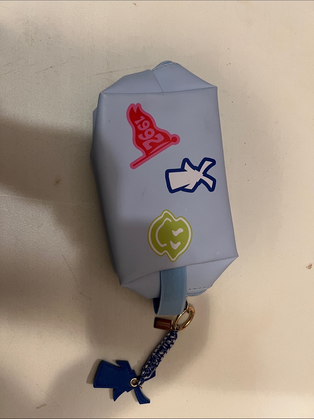 Dutch Bros Light Blue Cosmetic Pouch with Lime Green and Navy Accents